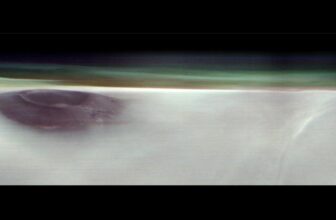 Mars Orbiter Captures Uncommon View of Historic Volcano Poking Above the Clouds